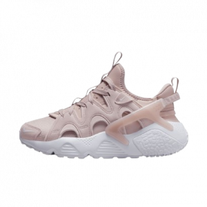 Plongez dans l'élégance féminine de la Nike Huarache Craft Rose. Une fusion délicate de confort et de style, offrant une touche de raffinement à chaque pas.